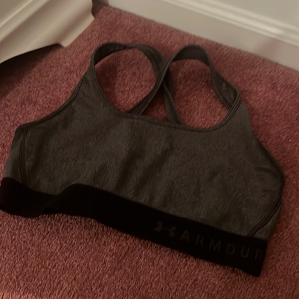 Grey underarmour, racerback sports bra with black elastic band